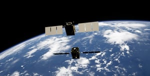 communication satellite flying over Earth